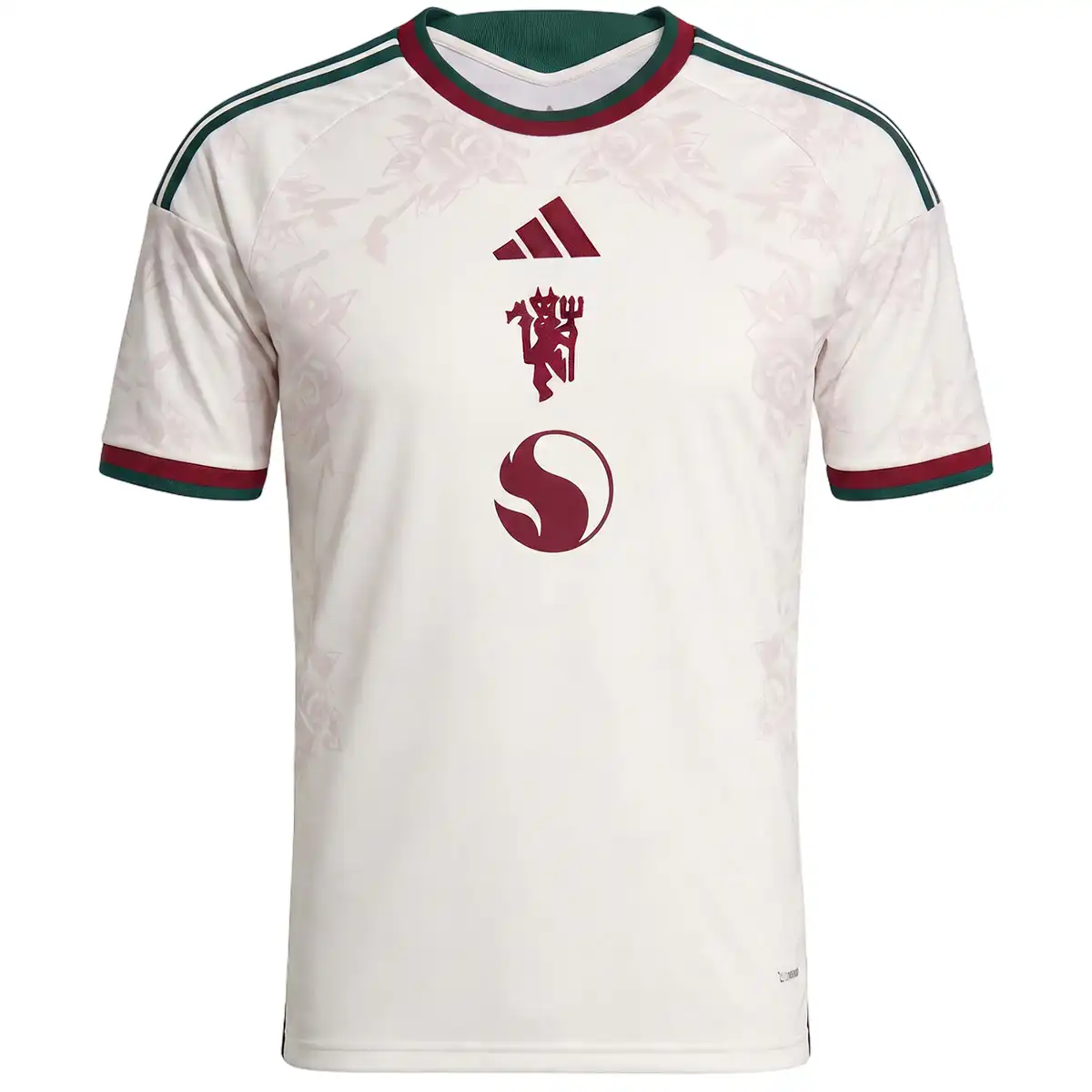 Current Flux third-shirt photograph with a light body, green and burgundy trim, and central emblem