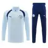 Manchester-City-Trainingsoberteil mit kurzem Reißverschluss am Kragen und Hose in Himmelblau/Marineblau 2026/27 – Vorderansicht